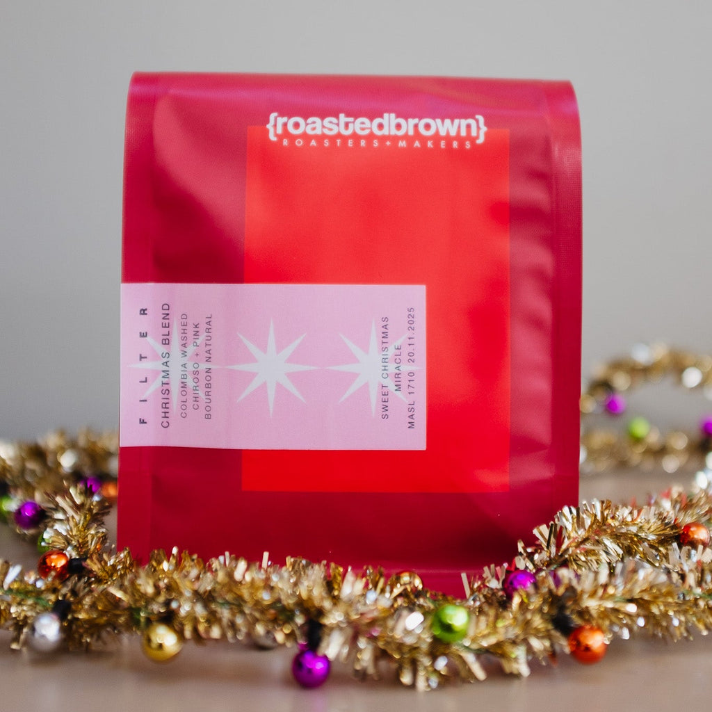 Roasted Brown's Limited Edition Christmas Coffee Blend in special edition red packaging. Roasted for filter brewing. 