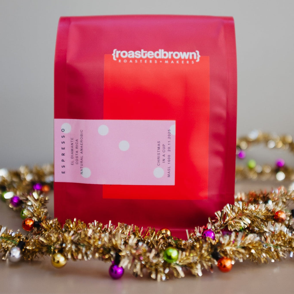 Roasted Brown's Limited Edition Christmas Coffee Blend in special edition red packaging. Roasted for espresso